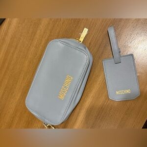 Moschino light blue Cosmetics Travel bag with luggage name tag